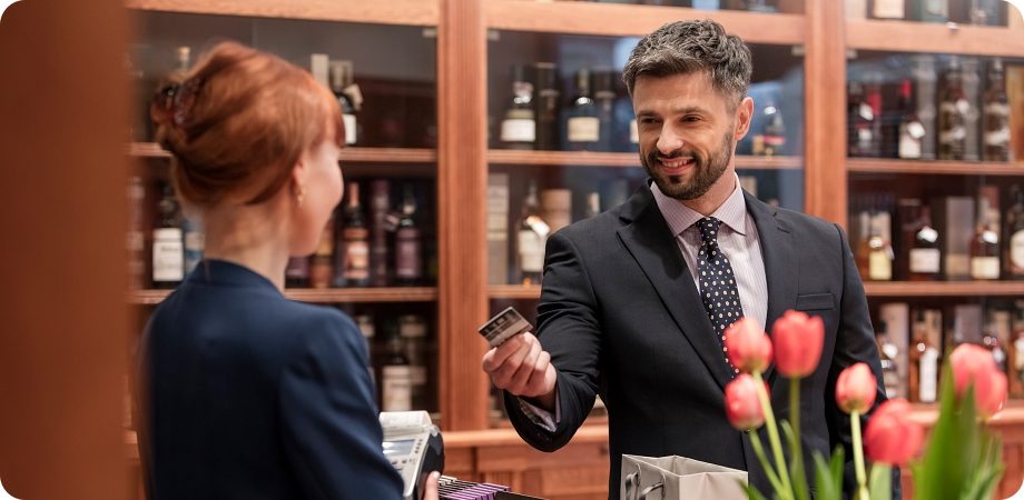 Customers shopping for wine in a store for a liquor license in Boca Raton, Florida