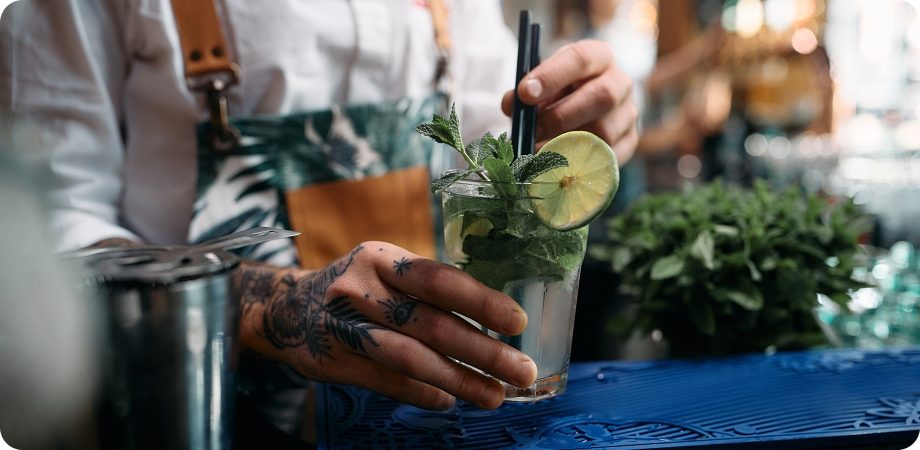 Bartender preparing a mojito for Delray Beach liquor license services
