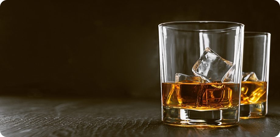 Whiskey on the rocks on a bar for buying a liquor license in West Palm Beach